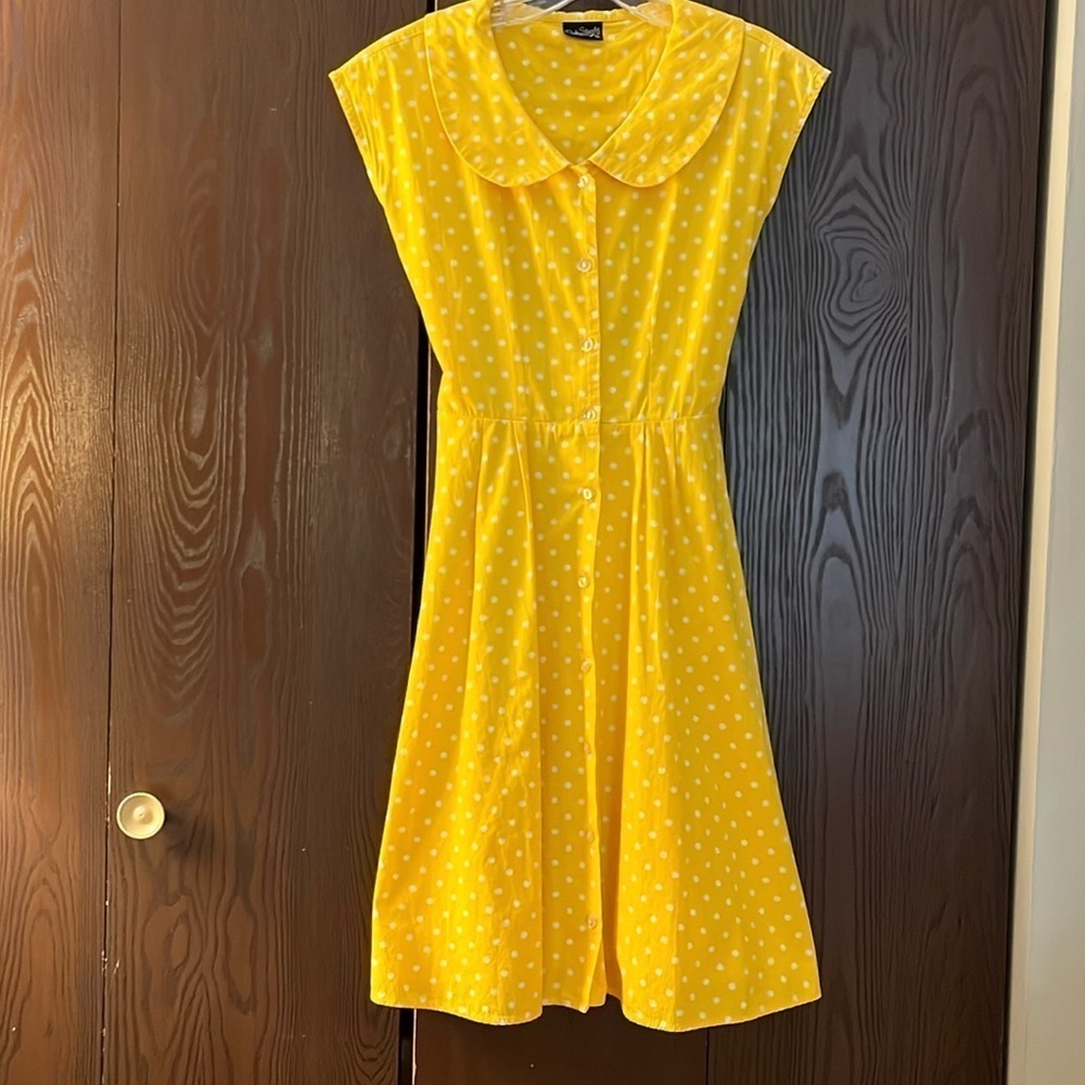 Rock Steady sleeveless bright yellow dress with white polka dots. Size Small